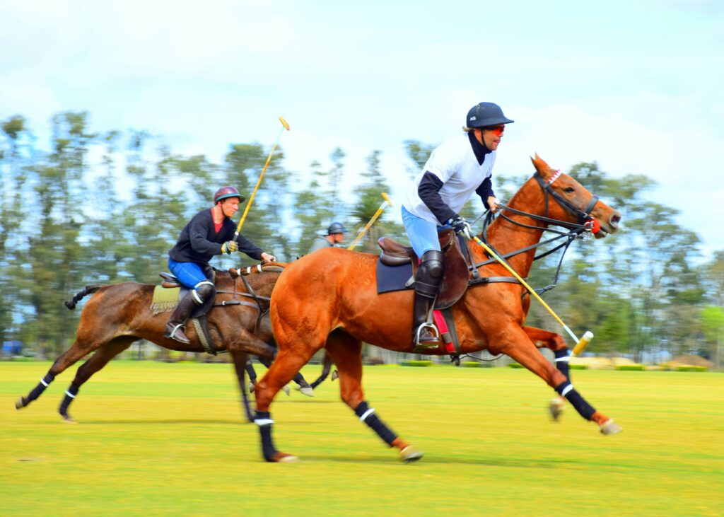 Playing polo in at the Newport International Polo Series. 